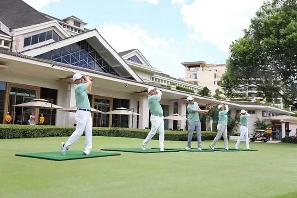 Corporate golf team in custom branded shirts