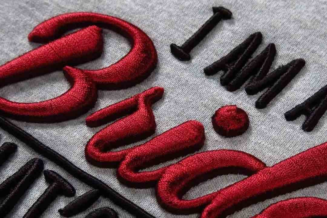 3D puff embroidery creating raised dimensional designs