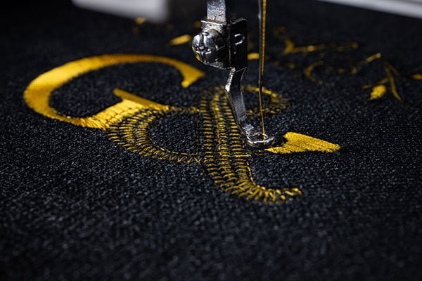 Professional logo embroidery on golf apparel