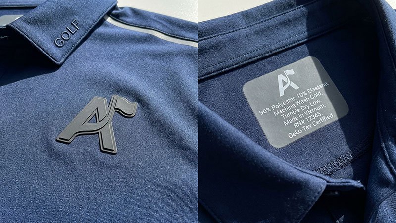 Branding, decoration, and compliance for custom apparel A close-up shot of a high-quality silicone logo on a performance fabric next to a care label