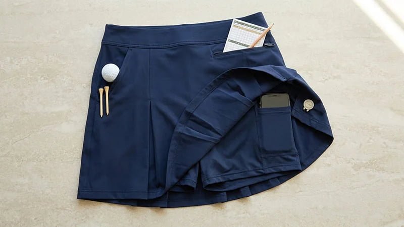 A diagram showing the optimal placement for phone, scorecard, and tee pockets on a skort.