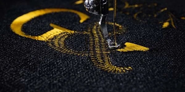 Embroidery details on golf apparel